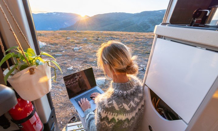 a woman working while on holiday