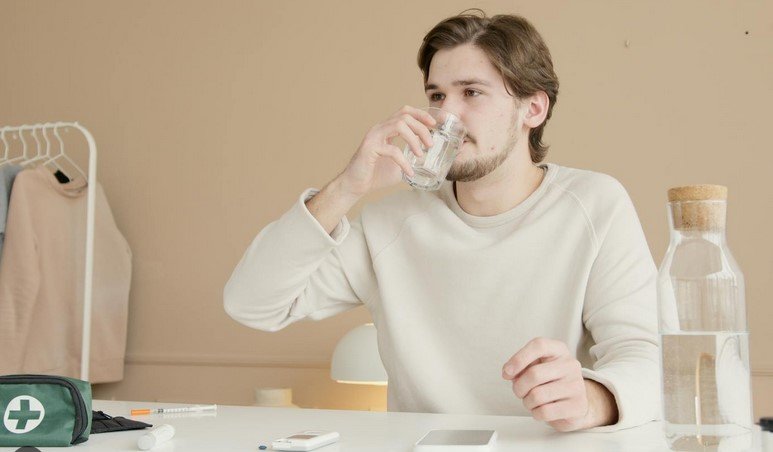 a man drinking water